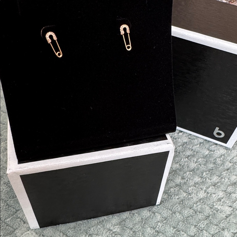 NWT 14k Yellow Gold and Diamond Safety Pin Earrings with clutch backing.